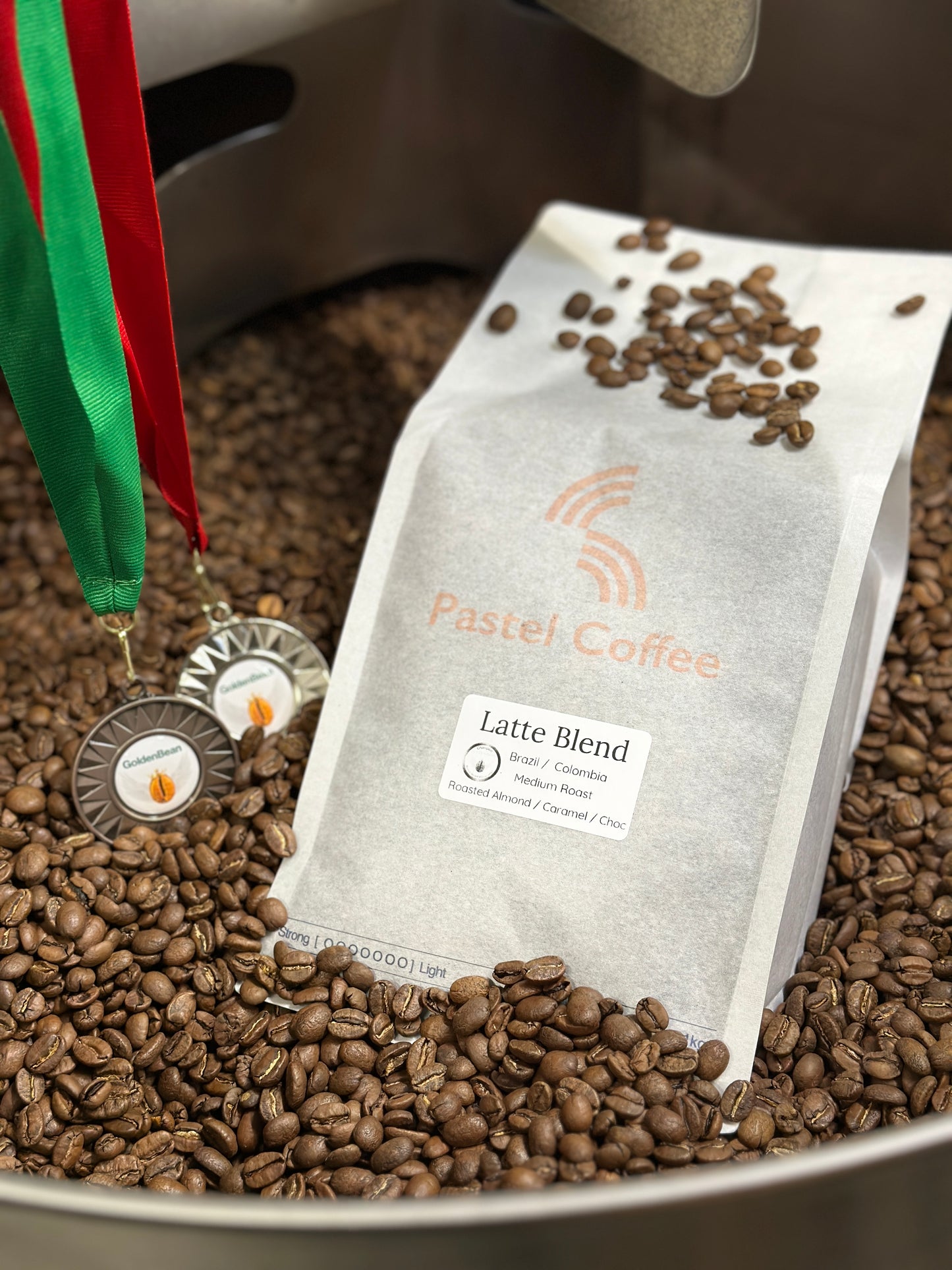 Award-winning Latte Blend with Golden Bean medals in the roaster drum